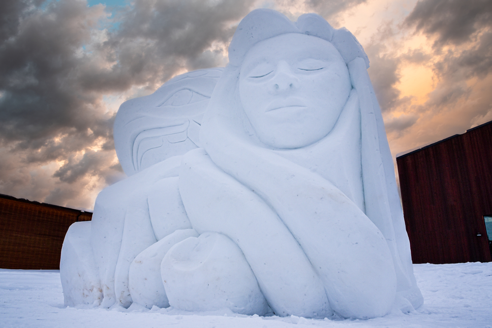 AiM Land Inuit Snow Sculpture